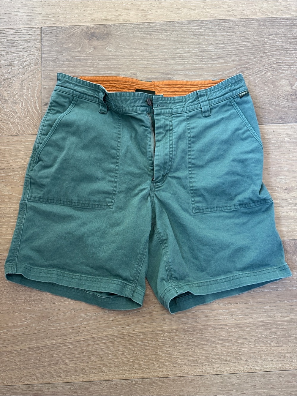 Howler Brothers Green Flat Front Shorts with Orange Waistband
